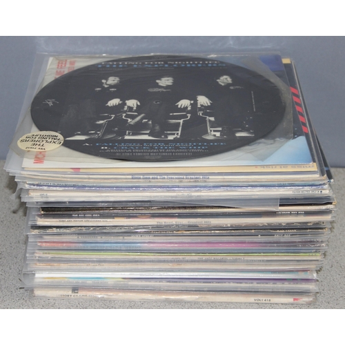 604 - Qty of vinyl record LPs to incl Status Quo, Phil Collins, The Police etc