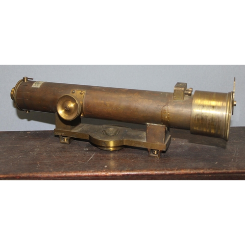 655 - An antique brass Theodolite in mahogany case, with 2 additional leather cased lenses, one by Dallmey... 