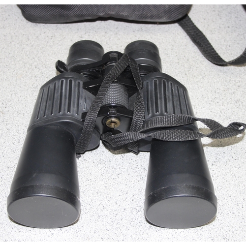 659 - 2 pairs of binoculars to incl Tasco model No. 312, and a Sunador Mega Zoom