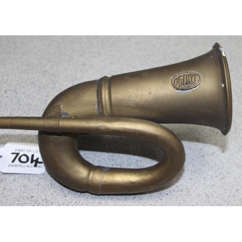 704 - Vintage brass bulb car horn by Deluxe and a 1973 Pirelli calendar