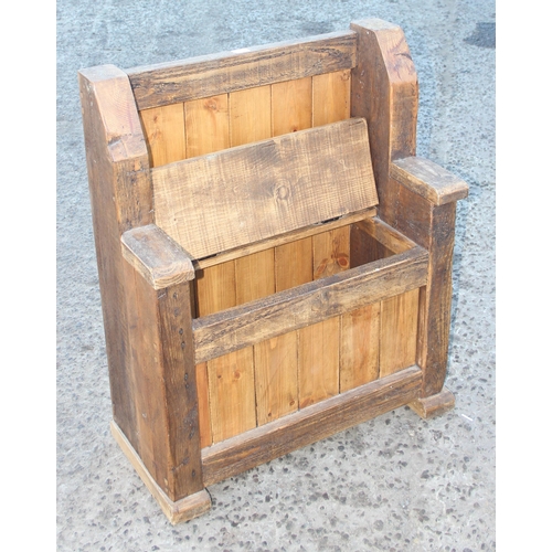 8 - A vintage rustic pine settle bench with storage, approx 77cm wide x 37cm deep x 93cm tall