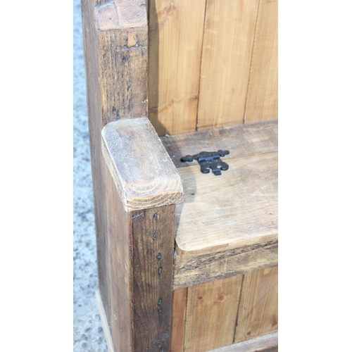 8 - A vintage rustic pine settle bench with storage, approx 77cm wide x 37cm deep x 93cm tall