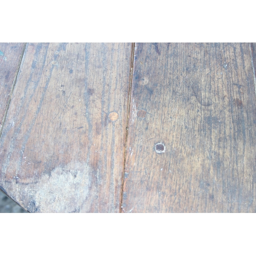 9 - An antique oak dropleaf gate leg table, approx 84cm wide x 34cm (100cm when raised) deep x 67cm tall