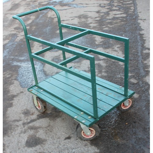 319 - A green garden utility trolley, approx 93cm wide x 62cm deep x 95cm tall