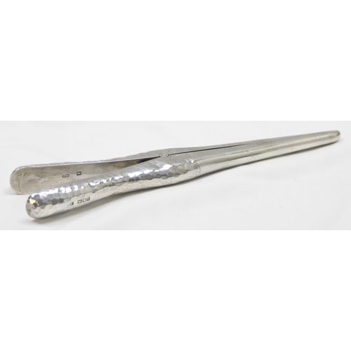 1002 - An unusual pair of Arts & Crafts period hammered silver glove stretchers, London 1901 by Percy White... 