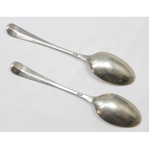 1004 - A pair of Georgian silver soup spoons, believed to be Scottish Provincial silver by Alexander Thomps... 