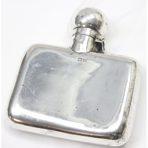 1033 - An antique silver hip flask, Chester 1902 by Nathan & Hayes, approx 9cm wide, approx 95.27g gross