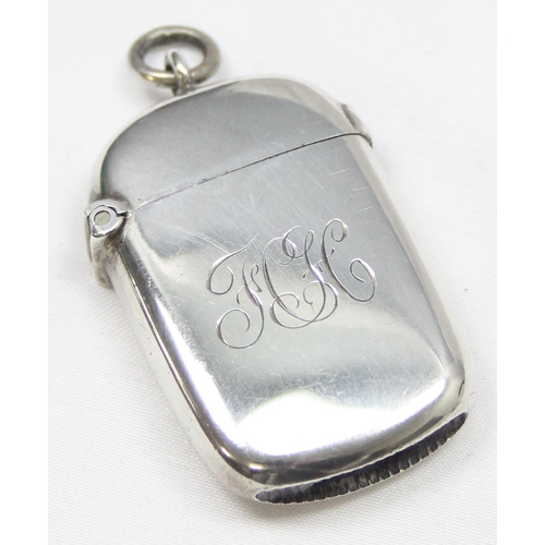 1034 - An antique silver vesta case of rounded form, Chester 1903 by William Neale, approx 18.69g gross