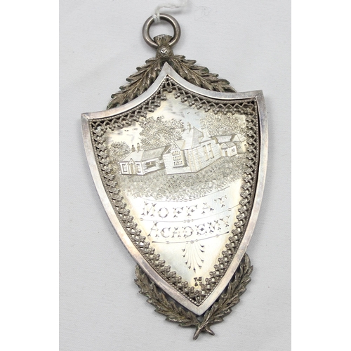 1036 - A highly decorative Moffat Academy silver medallion in case, awarded to William A Hepburn, Dux of Sc... 