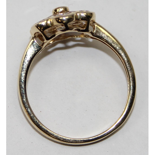 1109 - 14ct gold and white stone floral set ring, full hallmarks and XRF tested, approx size P, approx 2.92... 