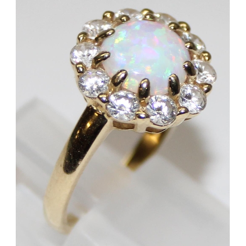 1110 - 14ct gold, white stone and opal set dress ring, full hallmarks and XRF tested, approx size P, approx... 