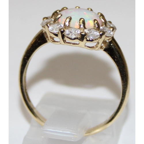 1110 - 14ct gold, white stone and opal set dress ring, full hallmarks and XRF tested, approx size P, approx... 