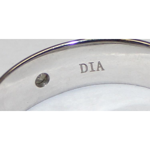 1124 - A retro style 9ct white gold and diamond set band ring, full hallmarks and XRF confirmed, approx siz... 