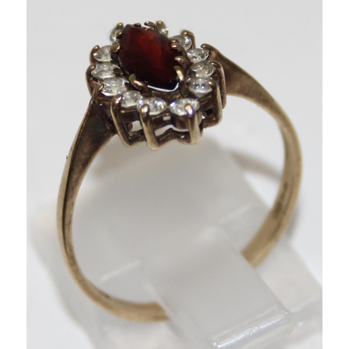 1125 - 9ct gold garnet and white stone set ring, marked and XRF confirmed, approx size N, approx 1.72g gros... 