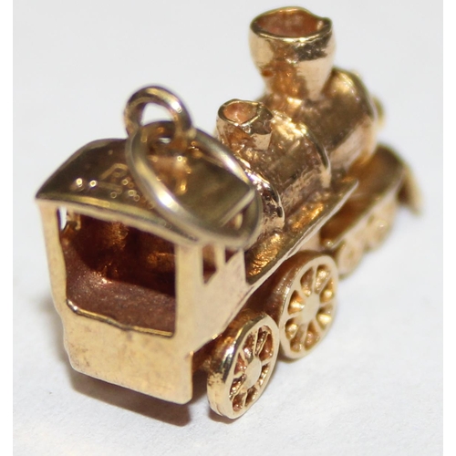 1138 - 9ct gold charm formed as a train, marked and XRF confirmed, approx 3.48g gross