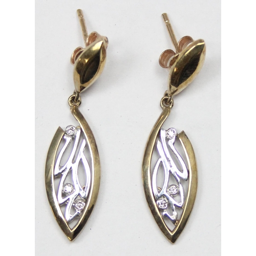 1140 - A pair of 9ct gold Art Nouveau style white and yellow gold earrings, each stem marked and XRF confir... 