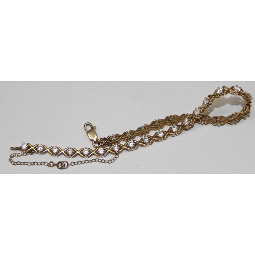 1141 - 9ct gold and white stone tennis bracelet, marked 375 & XRF confirmed, approx 20cm long, approx 8.93g... 