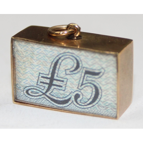 1143 - 9ct gold cased £5 note charm, fully marked and XRF confirmed, approx 2.98g gross