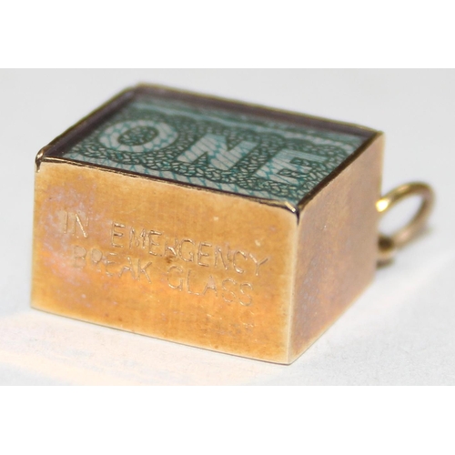 1144 - 9ct gold cased £1 note charm, fully marked and XRF confirmed, approx 2.86g gross