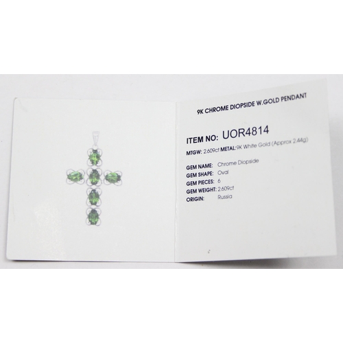 1145 - A 9ct white gold and chrome diopside set crucifix pendant, approx 38mm tall, approx 3.13g gross, wit... 