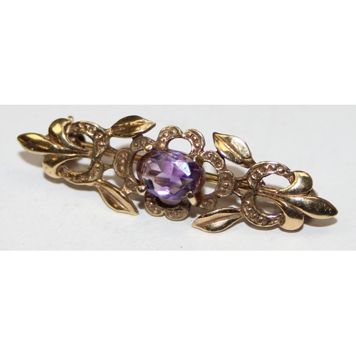 1151 - 9ct gold Art Nouveau style bar brooch set with amethyst, marked and XRF confirmed, approx 2.64g gros... 