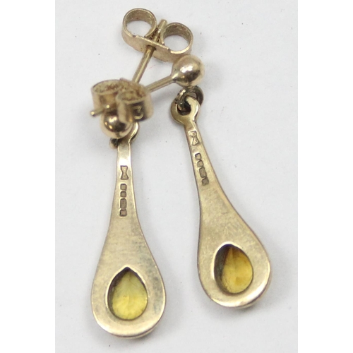 1153 - A pair of 9ct gold and citrine drop earrings with stud fastenings, marked and XRF confirmed, approx ... 