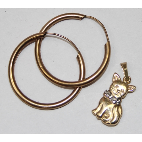 1154 - A pair of 9ct gold hoop earrings and a 9ct gold cat pendant, marked and XRF confirmed, approx 1.97g ... 