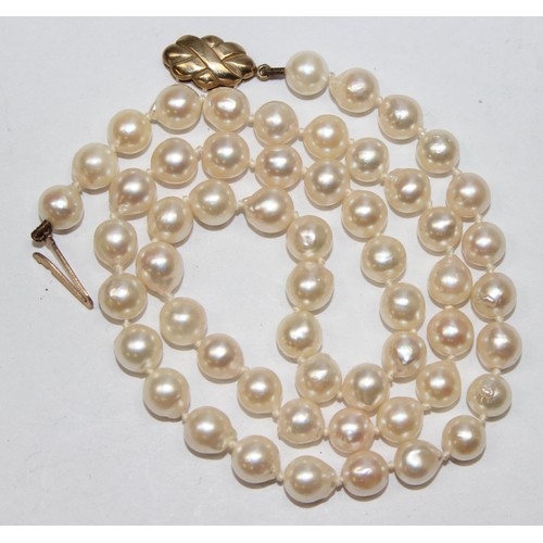 1168 - A vintage pearl necklace with 9ct gold clasp, marked and XRF confirmed, the pearls approx 6mm-7mm in... 