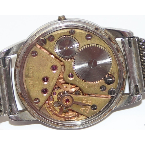 1329 - A vintage Omega gents wristwatch with 267 cal. movement and gilt baton numerals to dial, with a vint... 