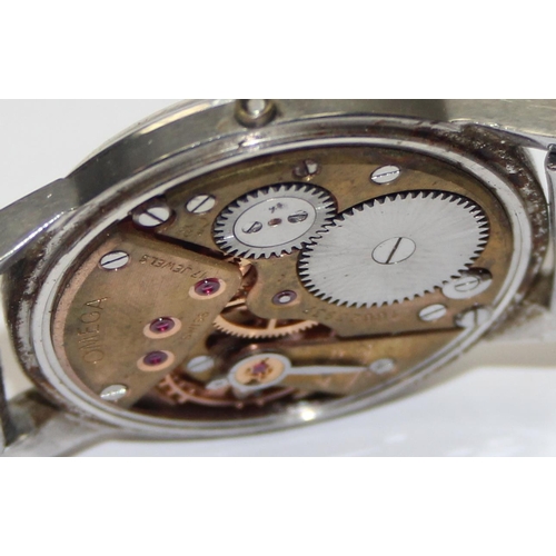 1329 - A vintage Omega gents wristwatch with 267 cal. movement and gilt baton numerals to dial, with a vint... 