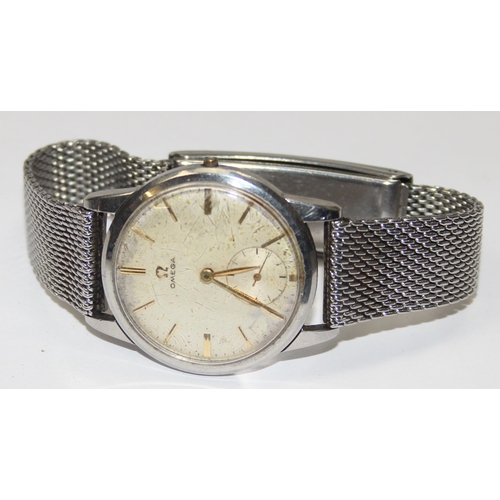 1329 - A vintage Omega gents wristwatch with 267 cal. movement and gilt baton numerals to dial, with a vint... 