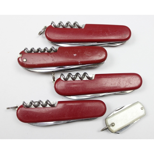 1418 - 5 assorted Swiss Army or penknives, 4 Victorinox (3 having Unipart advertising) and one with Caltex ... 