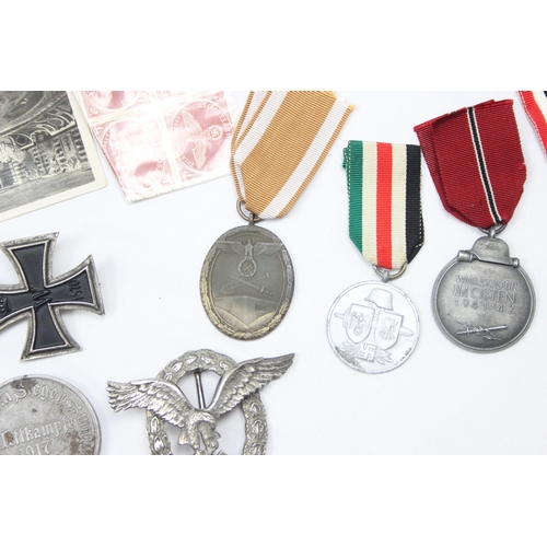 1422 - Qty of assorted German related militaria and badges, WW1, WW2 and Post WW2 items to inc medals, badg... 