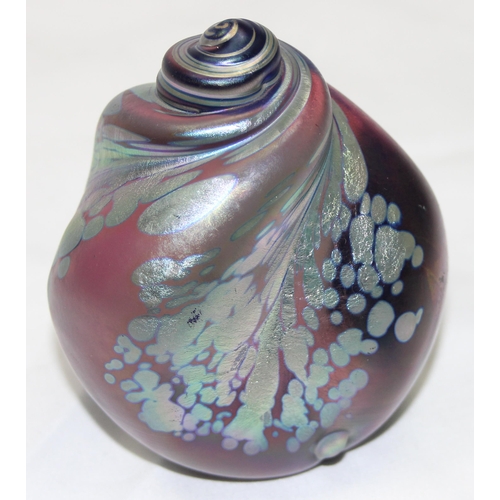 1658 - An Iridescent Art Glass paperweight formed as a sea shell, in the manner of Ditchfield & Okra, vario... 