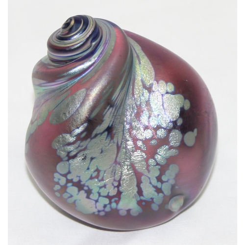 1658 - An Iridescent Art Glass paperweight formed as a sea shell, in the manner of Ditchfield & Okra, vario... 