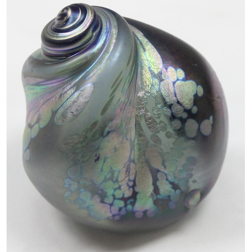 1658 - An Iridescent Art Glass paperweight formed as a sea shell, in the manner of Ditchfield & Okra, vario... 