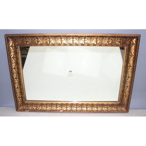 494 - Large antique mirror with decorative gilt frame, approx 85cm x 58cm