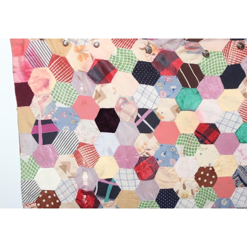 207A - A highly decorated colourful vintage patchwork quilt or blanket, likely early 20th century, approx 1... 