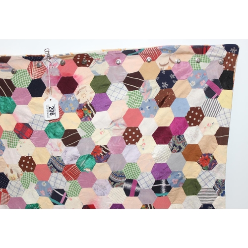 207A - A highly decorated colourful vintage patchwork quilt or blanket, likely early 20th century, approx 1... 