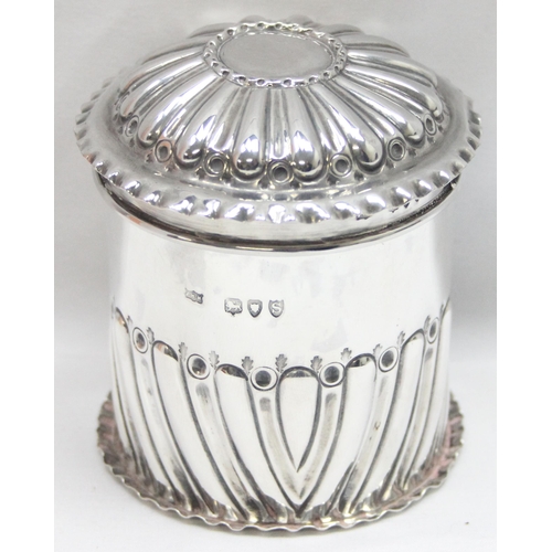 1046 - A Victorian embossed silver tea caddy, London 1893 by John Newton Mappin, approx 8cm tall, approx 96... 