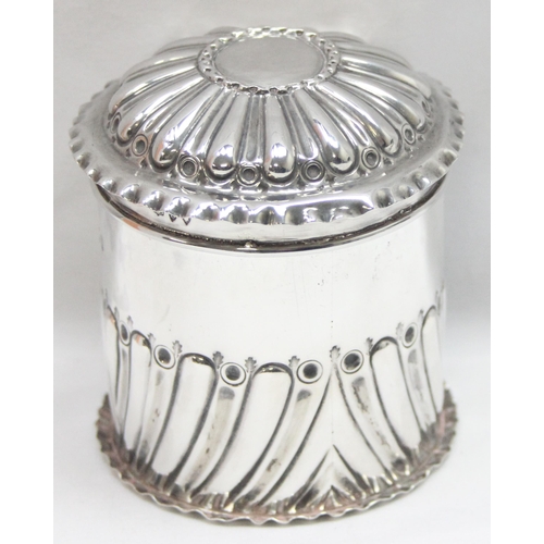 1046 - A Victorian embossed silver tea caddy, London 1893 by John Newton Mappin, approx 8cm tall, approx 96... 