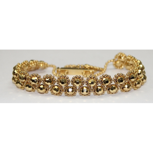 1103 - A 9ct gold Indian Maharani bead bracelet, marked 375 and with import hallmarks and XRF confirmed, wi... 