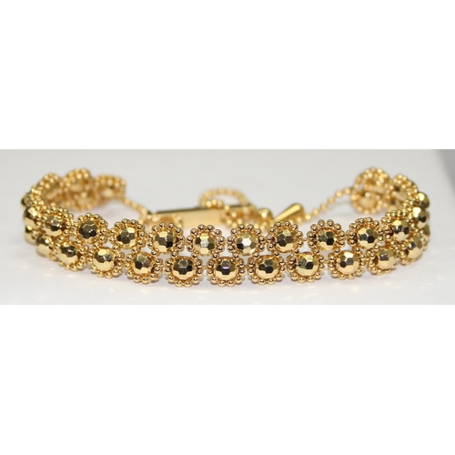 1103 - A 9ct gold Indian Maharani bead bracelet, marked 375 and with import hallmarks and XRF confirmed, wi... 