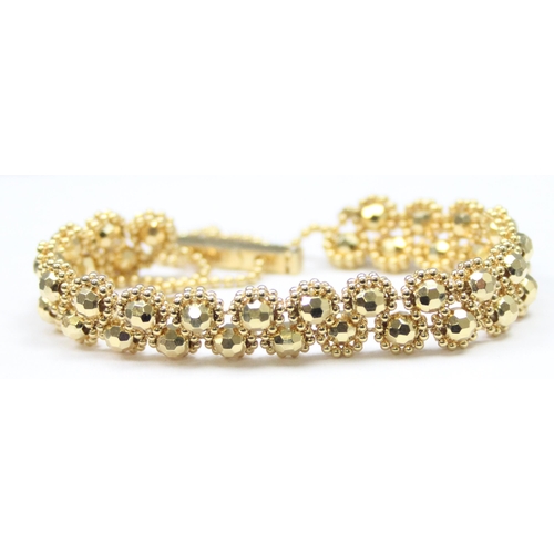 1103 - A 9ct gold Indian Maharani bead bracelet, marked 375 and with import hallmarks and XRF confirmed, wi... 