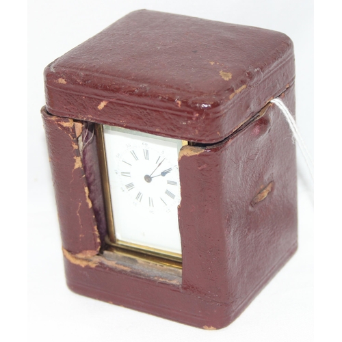 1334 - A rare antique miniature brass cased carriage clock in original leather case, likely late 19th centu... 