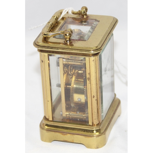 1334 - A rare antique miniature brass cased carriage clock in original leather case, likely late 19th centu... 