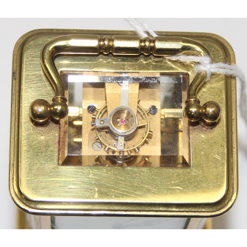 1334 - A rare antique miniature brass cased carriage clock in original leather case, likely late 19th centu... 