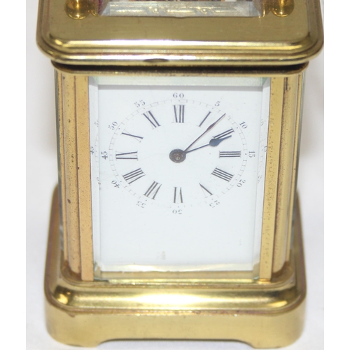 1334 - A rare antique miniature brass cased carriage clock in original leather case, likely late 19th centu... 