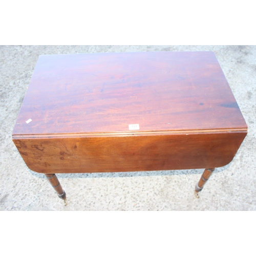 151 - An antique dropleaf mahogany table with turned legs, single drawer and brass castors, approx 102cm/ ... 