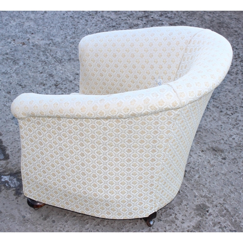 158 - An antique cream upholstered tub chair with turned wooden feet, approx 70cm wide x 70cm deep x 70cm ... 